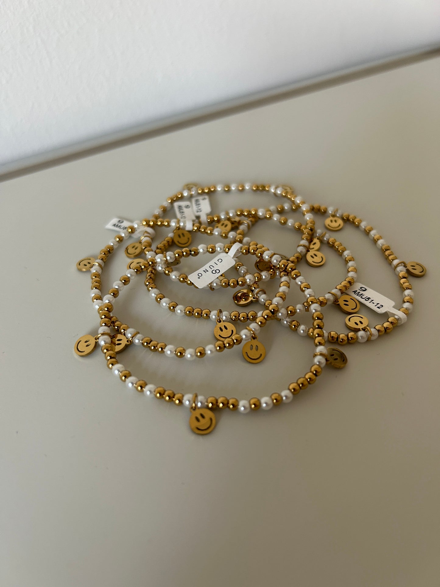 Perlenarmband Smiley weiß gold